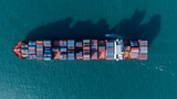 Fototapeta Uliczki - Aerial view cargo container ship, Container cargo vessel ship carrying container for import export freight shipping, Global logistic sea freight shipping logistic cargo vessel.