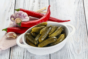 Canvas Print - Marinated small cucumbers in the bowl