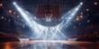 A basketball arena with spotlights shining down.