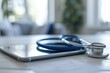 © sornthanashatr - A tablet with a stethoscope and a medical document on it