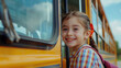 Little Girl Standing Next to Yellow School Bus