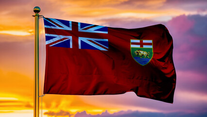 Manitoba Waving Flag Against a Cloudy Sky at Sunset.