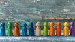 Wooden figurines representing people social inclusion, diversity and solidarity, concept background