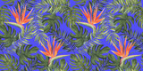 Fototapeta Dziecięca - Beach cheerful seamless pattern wallpaper of tropical dark green leaves of palm trees and flowers bird of paradise (strelitzia) on a bright blue violet background