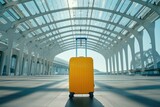 Fototapeta Londyn - Yellow suitcase for travel in the airport terminal on background of modern architecture.