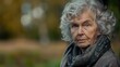 © Fotograf - Elderly woman wearing scarf and hat, suitable for winter fashion concept