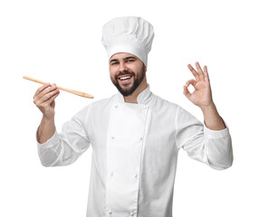 Canvas Print - Happy young chef in uniform tasting something and showing ok gesture on white background