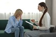 © New Africa - Professional psychotherapist working with patient in office