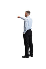 Young man, confident entrepreneur, motivated office worker in smart casual outfit pointing to distance against transparent background. Concept of business, work, human emotions, facial expression, ad.