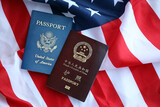 Fototapeta  - Passport of China Republic with US Passport on United States of America folded flag close up