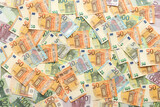 Fototapeta  - Many european euro money bills. Lot of banknotes of european union currency close up