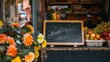 Blank blackboard sign at the entrance of a charming fruit shop, inviting fresh picks of the day