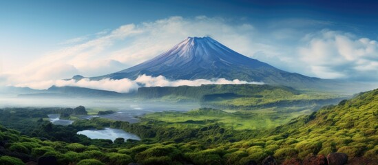 Aufkleber - Volcanic peak overlooking tranquil lake and lush woodland