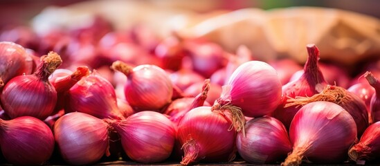 Aufkleber - Red onions close-up on wooden surface