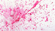Coral pink paint splatter on a pure white background