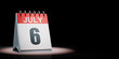 July 6 Calendar Spotlighted on Black Background