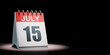 July 15 Calendar Spotlighted on Black Background
