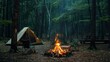 Beautiful bonfire with burning firewood near chairs and camping tent in forest. Campfire by a chairs and a tent. copy space for text.