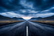 Empty asphalt road, dark cloudy weather
