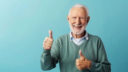 Wall Mural - A man in a green sweater is giving a thumbs up. He is smiling and he is happy. cheerful elderly grandfather showing thumbs up on a colored monochrome background on the right side of the image