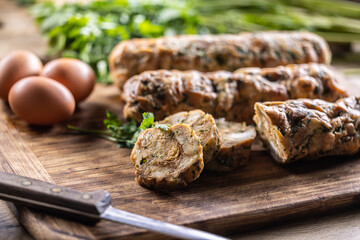 Wall Mural - Traditional Czech Karlovy Vary dumplings on a cutting board