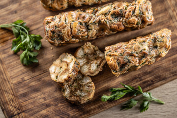 Wall Mural - Traditional Czech Karlovy Vary dumplings on a cutting board