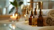 © sorin - Spa room setting with bottles of skin care serum and natural cosmetics for face and body beauty