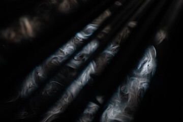 Wall Mural - mysterious light rays in the shadows