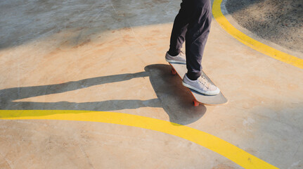 Wall Mural - Skateboarder skateboarding at skatepark in city