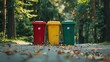 close-up three garbage bin in the park. colorful bin, red , yellow , green . Love cleanliness for social and green country. copy space for text.