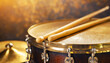 Close-up of two wooden drumsticks on an old metallic snare drum and golden colored cymbal with copy space. Percussion instrument concept. Generative Ai.