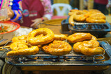 Fototapeta Miasta - Grilled Northern Thai Sausage on a Rack