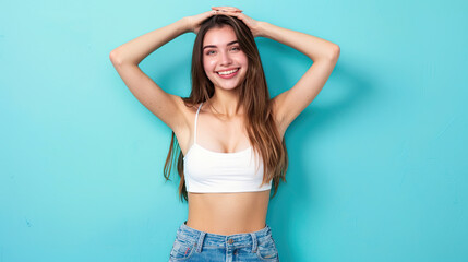 Wall Mural - Portrait of a happy young girl celebrating success on pastel blue background