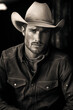 © Tony Marturano - A rugged man in a cowboy hat exudes a tough, contemplative look, with a hint of the Wild West in his gaze