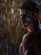 Handsome young man with muscular body and pecs under the rain