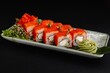 Delicious Sushi Roll with Caviar, Cream Cheese, Cucumber, Wasabi, and Ginger on White Plate