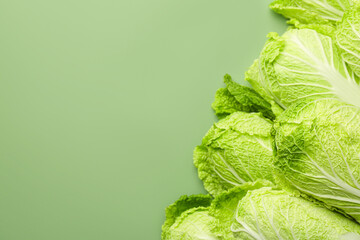 Wall Mural - Many fresh Chinese cabbages on pale green background, top view. Space for text