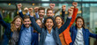 © Mr. Stocker - Excited business team celebrating success outdoors