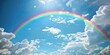 A rainbow arching across the sky, symbolizing hope and joy on Easter day. Blue skies with white clouds in the background.