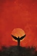 Fallen Angel: Dark Silhouette with Spread Wings Standing on Black Ground Against Crimson Sky and Orange Sun Disk