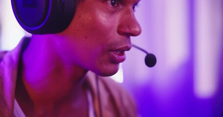 Aufkleber - Gamer, headphones and man streamer at home for online battle, challenge or esports contest advice. Face, help and gaming pro with microphone for digital conversation, podcast or social network chat