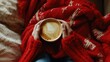 Top view of a female hands with a cup of coffee. The cup rests in her hands, an invitation to indulge in a moment of bliss.