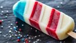 a popsicle with red white and blue stripes