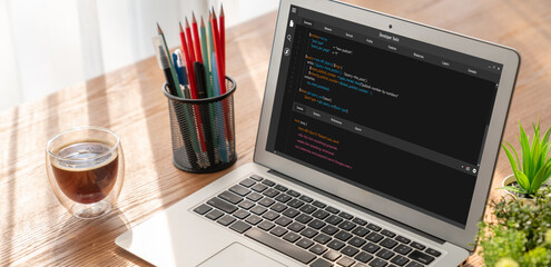 Software development programming on computer screen for modish application and program coding