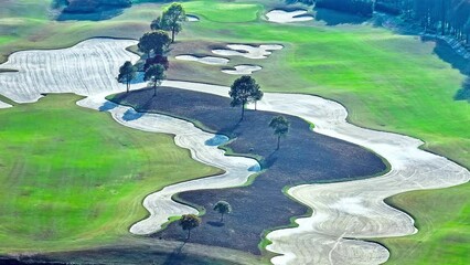 Wall Mural - Aerial view of golf course on sunny day