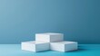 © buraratn - Square podiums are white. Abstract background. A stage for the demonstration of cosmetics. Podium for the award, consisting of three 3 square figures of different sizes on a blue background. Showcase