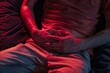 A young man clutching his abdomen in pain, suffering from acute discomfort or illness. Man with Acute Abdominal Pain Needing Help