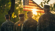 A diverse group of veterans from different military branches and generations standing solemnly around a flagpole, with the American flag hoisted high. The morning light casts soft