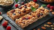 A close-up of granola bars with a crunchy texture and nutritious ingredients such as oats, dried fruits and nuts. Granola bars for a quick snack or energy boost.