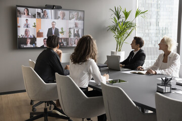 worldwide communication by business using video conference application. staff members engaged in vir